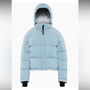 The Super Puff™ Shorty French Hi-Vis reflective goose puffer jacket Aritzia